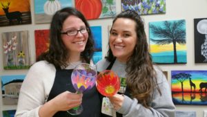 Painting on wine glasses at the Paint Shack in Eau Claire