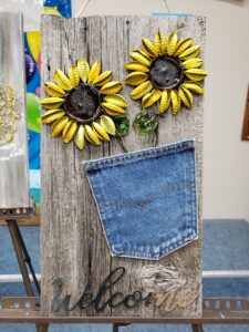 Sunflowers- recycled beer bottles, wine bottles and barbed wire